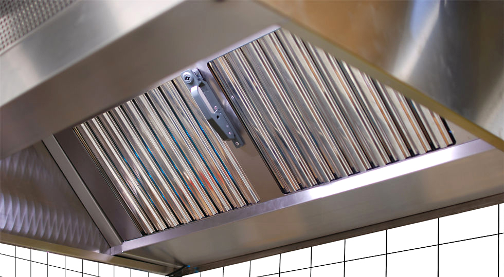 Um close-up de um exaustor de ventilação para restaurantes e cozinhas comerciais